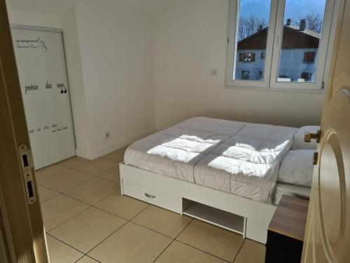 Posteľ alebo postele v izbe v ubytovaní Appartement - Cluses