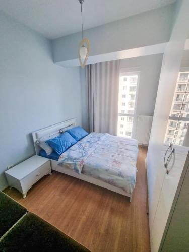 En eller flere senger på et rom på Feel at home - Stylish Apartment