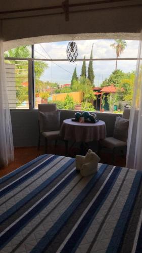 Ένα ή περισσότερα κρεβάτια σε δωμάτιο στο Casa de la Abuela