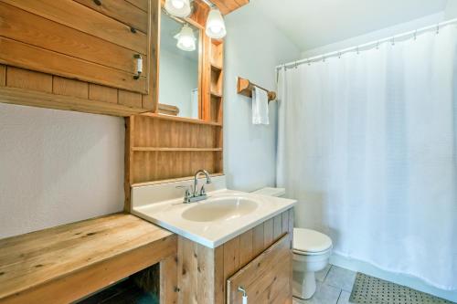 a bathroom with a sink and a toilet at Tarpon Drive Hideaway Unit B in Avon
