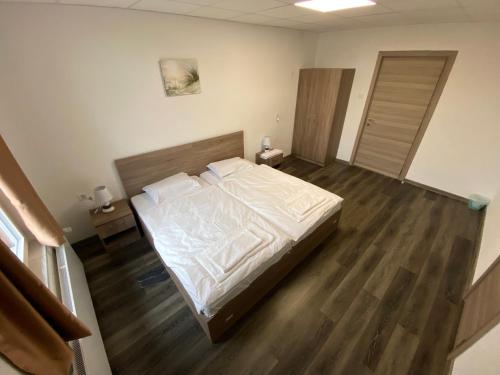 Ένα ή περισσότερα κρεβάτια σε δωμάτιο στο Hotel da Luca