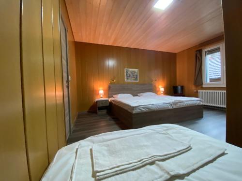 Postel nebo postele na pokoji v ubytování Hotel da Luca