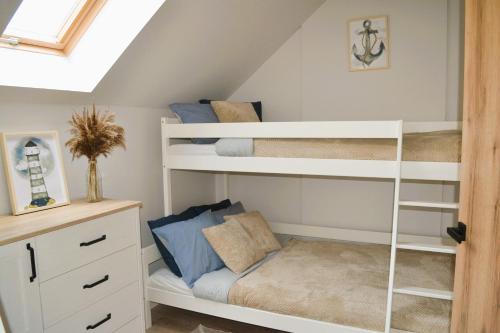 Ένα ή περισσότερα κρεβάτια σε δωμάτιο στο Norda Loft
