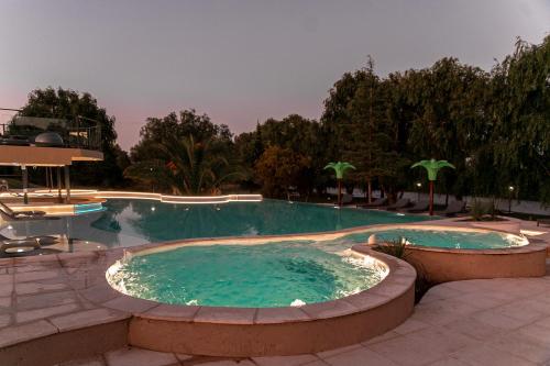 a large swimming pool in a resort at Cabañas Rio Soñado in Valle Grande