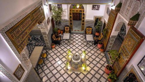 an overhead view of a tile floor in a building at Riad Green House in Fez