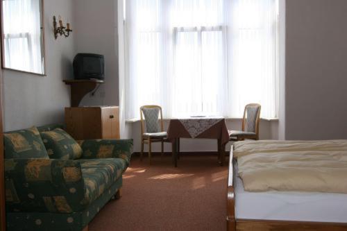Una cama o camas en una habitación de Hotel Rummeni
