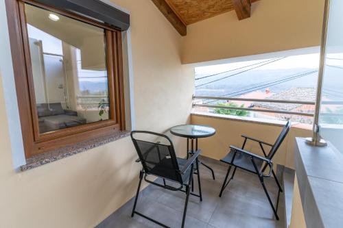 Un balcón o terraza en Apartma Valič