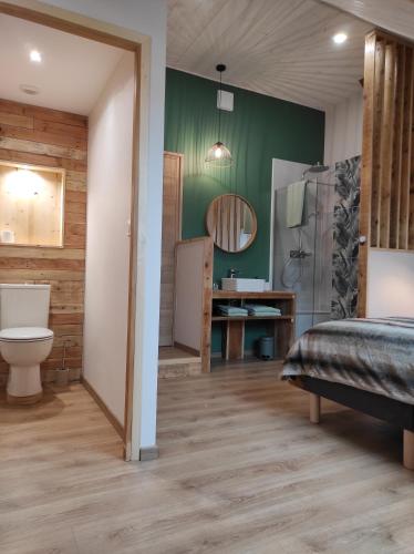 Koupelna v ubytování Le Grenier - Chambre d'hôtes