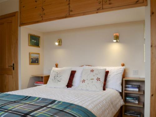 Postel nebo postele na pokoji v ubytování Padraigs Cottage