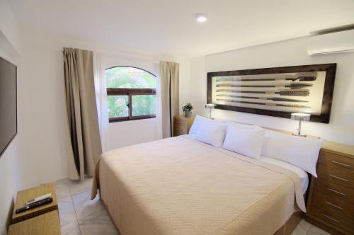 Postel nebo postele na pokoji v ubytování Resort Atlantic Villas & Spa