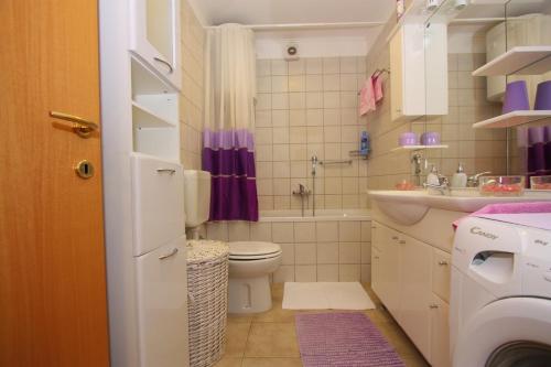 Kúpeľňa v ubytovaní Apartment Deluxe Sea View Split