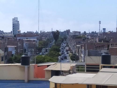 a view of a city from the roof of a building at Ambigua Hospedaje in Trujillo