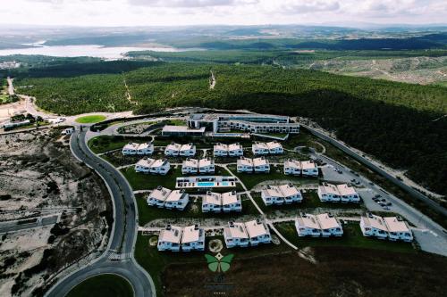an aerial view of a resort complex with a road at Royal Obidos Scenic Resort in Casal da Lagoa Seca