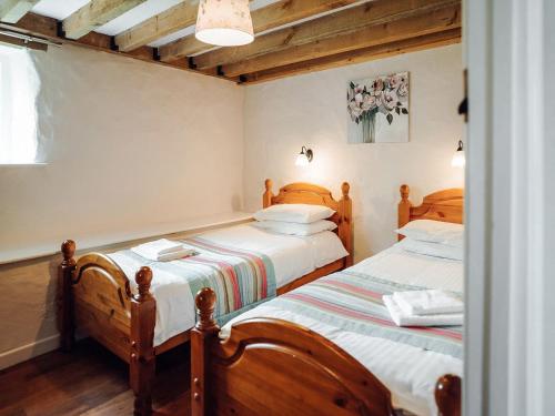 Postel nebo postele na pokoji v ubytování Flemish Cottage - Uk6720
