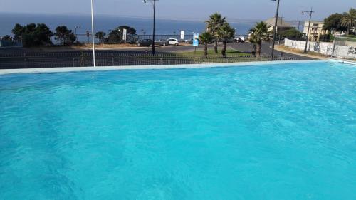 lindo y exclusivo Departamento en Costa Concón , con piscina vista al mar y otra temperada