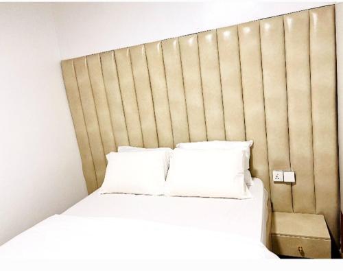 Кровать или кровати в номере 1-bedroom apartment at Asokoro by ECOWAS