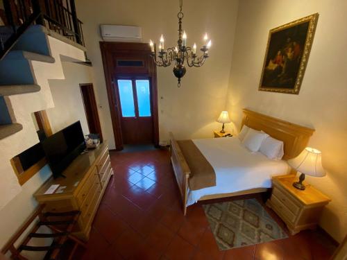 Estrella de Belem B&B and Spaにあるテレビまたはエンターテインメントセンター