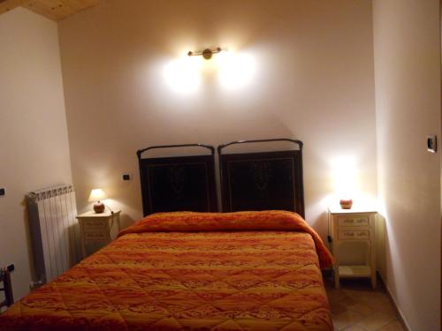 Ein Bett oder Betten in einem Zimmer der Unterkunft Agriturismo Monti Sibillini Camperato