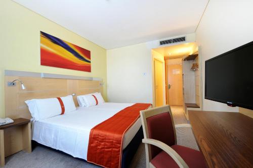 Posteľ alebo postele v izbe v ubytovaní Bes Hotel Bergamo Ovest