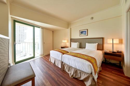 Cama o camas de una habitación en Lotte Hotel Guam