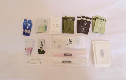 a group of products are laid out on a table at No25 Hotel Mokpo Sangdong in Mokpo