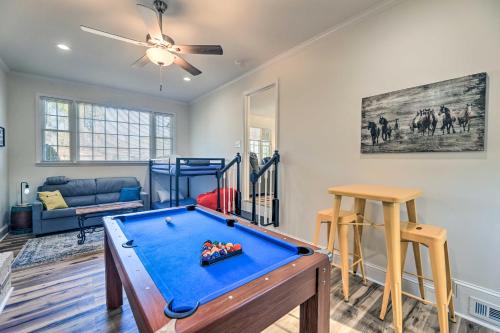 a living room with a pool table and a couch at Family-Friendly New Bern Home with Backyard! in New Bern