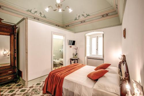 Cama o camas de una habitación en Palazzo Stunis - Dimora di Charme