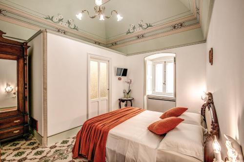 Cama o camas de una habitación en Palazzo Stunis - Dimora di Charme