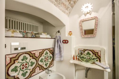 Un baño de Palazzo Stunis - Dimora di Charme