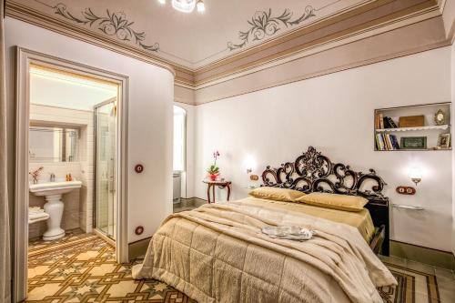 Cama o camas de una habitación en Palazzo Stunis - Dimora di Charme