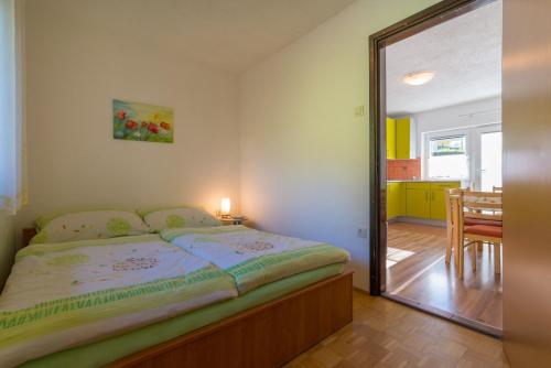 Postel nebo postele na pokoji v ubytování Ela Apartments - 2