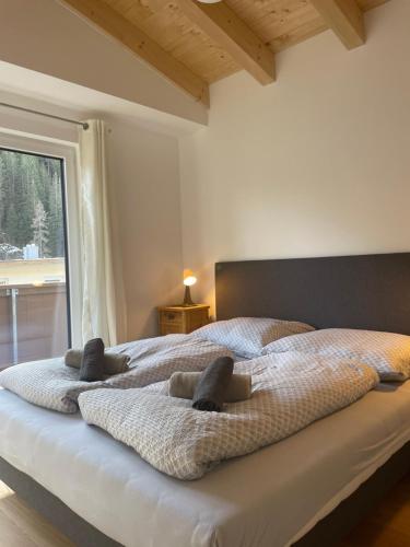 Postel nebo postele na pokoji v ubytování Tuxie Haus