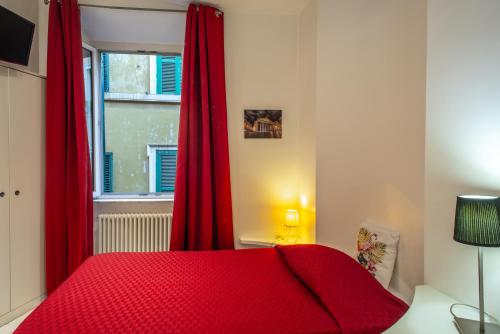 Postel nebo postele na pokoji v ubytování Intra' Residenza in Trastevere
