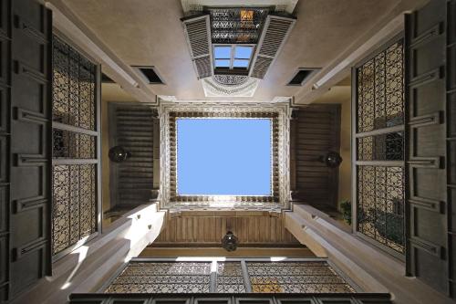 an empty room with a window and a window frame at Riad Dar One in Marrakech