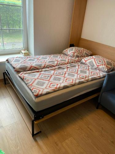 Llit o llits en una habitació de Taikos 3 studio
