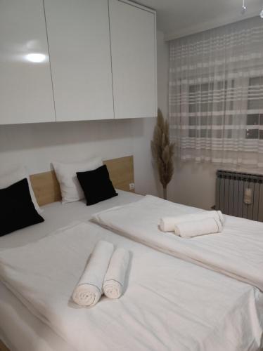 Posteľ alebo postele v izbe v ubytovaní LOLA HOME