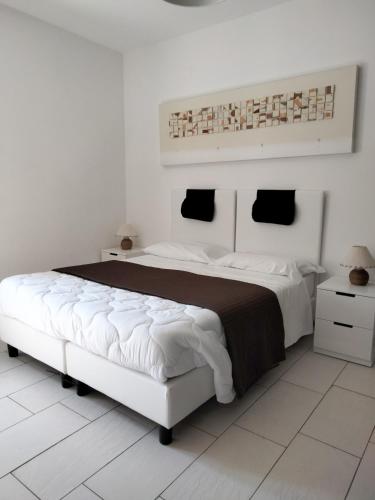 Ένα ή περισσότερα κρεβάτια σε δωμάτιο στο Casale Mammarella