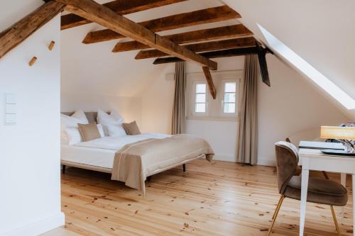 Un ou plusieurs lits dans un hébergement de l'établissement Hotel Gut Landscheid