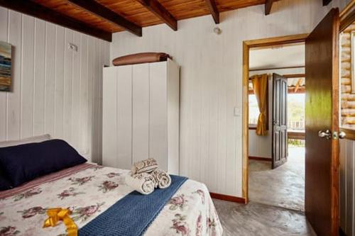 Ένα ή περισσότερα κρεβάτια σε δωμάτιο στο Ko'ëtï Yahveh