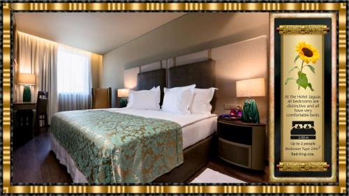 a hotel room with a large bed and a sign at Hotel Jaguar Oporto - Airport to Hotel and City Center and Vice-Versa is a Free and Continuous Shuttle Service from 7AM to 8PM in Porto