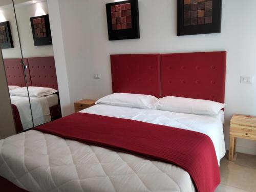 Ένα ή περισσότερα κρεβάτια σε δωμάτιο στο Casale Mammarella