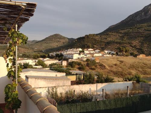 a view of a village from the roof of a house at Casa Holmes in Las Casillas