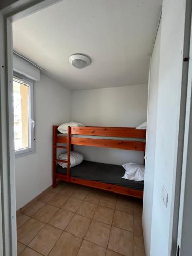 Ένα ή περισσότερα κρεβάτια σε δωμάτιο στο Appartement 3* tt équipe proche océan