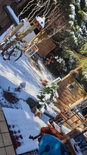 an aerial view of a house in the snow at Ferienwohnung Landidylle in Gieckau