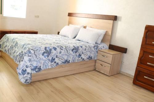 Ένα ή περισσότερα κρεβάτια σε δωμάτιο στο Belle Vue