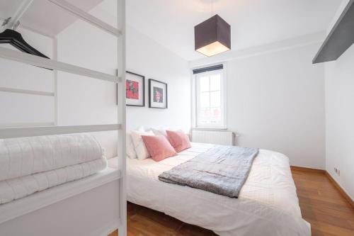 Кровать или кровати в номере Penthouse une chambre idéalement situé