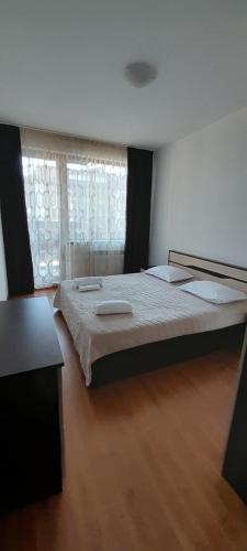 Postel nebo postele na pokoji v ubytování Belvedere Holiday Club К302