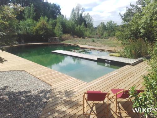 Gîte Les Cabanes de Fallot pour 15 personnes - piscine naturelle