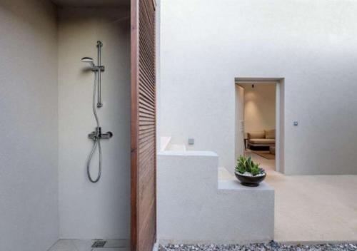 a bathroom with a shower and a sink at Villa Alliopi ein Blick für die Sinne in Kranidi