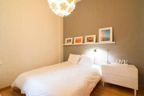 Giường trong phòng chung tại Victoria FreshApartments by Bossh! Apartments